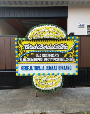 Papan Bunga Duka di Sudiroprajan